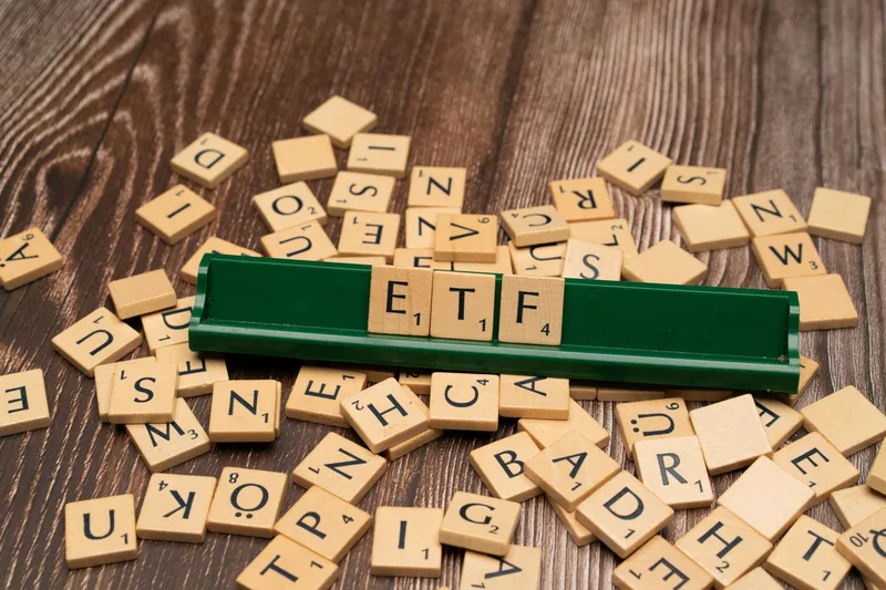 Index Funds vs ETFs: Which Is Better for American Investors? - financial planning concept