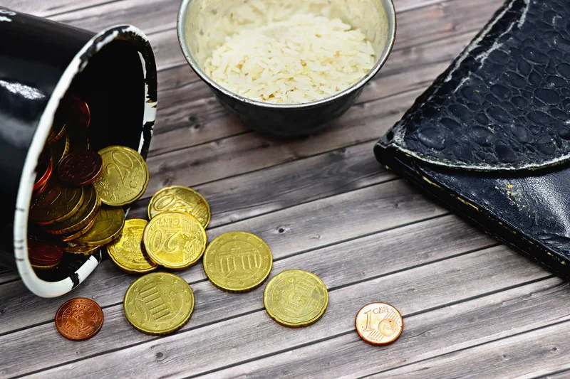 American calculating net worth with calculator and financial statements