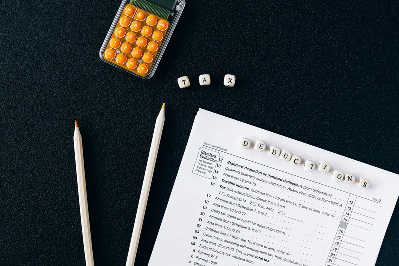 Standard vs Itemized Deductions: Which Should You Choose? - financial planning concept